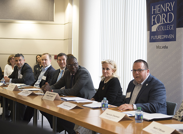 Secure 24 COO Paul Bhatti, Secure 24 VP Nick Ilitch, HFC President Russ Kavalhuna, Lt. Gov. Garlin Gilchrist, U.S. Rep Debbie Dingell, HFC faculty member Todd Browning.