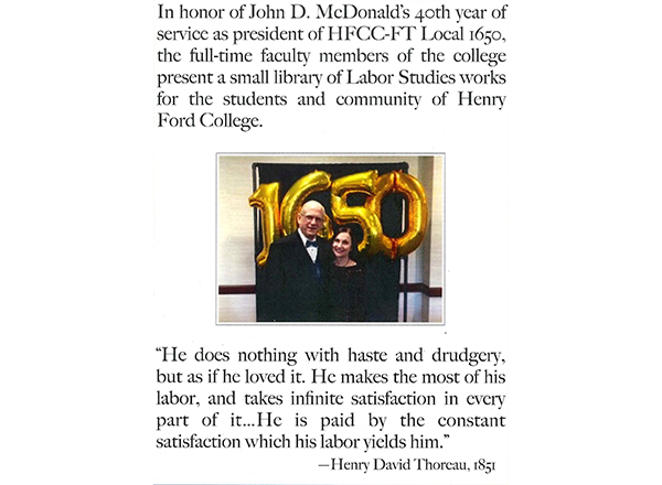 The explanatory sign at the Library of Labor Studies, which celebrates John McDonald's 40 years as president of Local 1650. In the photo, he's pictured with his wife, Denise. 