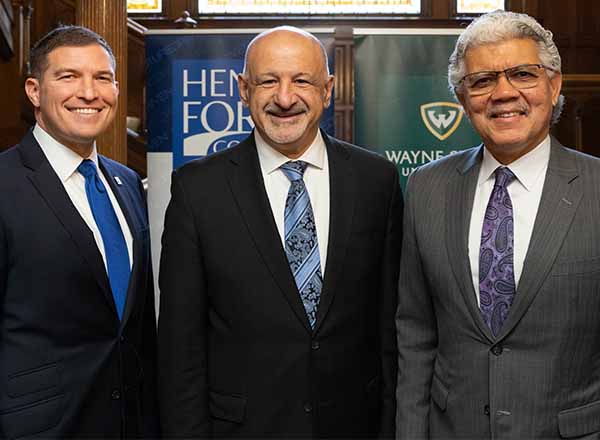 From L-R: HFC President Russell Kavalhuna, HFC Board of Trustees Member Hussein Berry, and Wayne State University President Dr. M. Roy Wilson. 