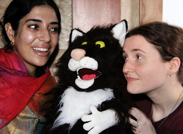 HFC students Amal Khalil and Hannah Whitaker with Gita the puppet. 