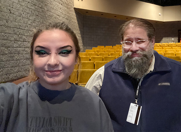 Kourtney Collins takes a selfie with Theatre director, John Sefel in the Adray Auditorium. 