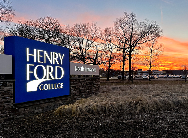 Image of HFC North Entrance sign at sunset