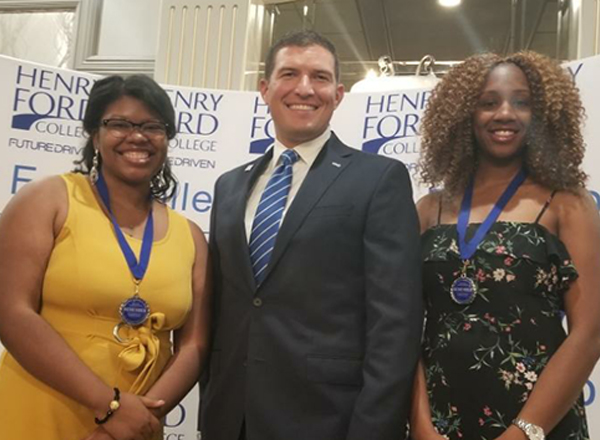 HFC students Azalea Hill (left) and Demitria Dawson (right) with HFC President Russell Kavalhuna.  