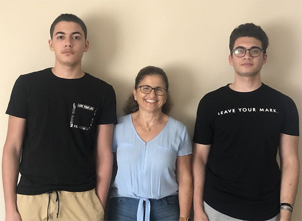 HFC math professor Nahla Haidar (center) is flanked by her nephews, Chady Abdou Aly (left) and Maher Abdou Aly (right). Haidar encouraged her nephews to attend HFC to transition into college life and learn about life in the U.S. Both of them followed her advice. Chady begins his studies at HFC this fall. Maher finished his HFC studies and transferred to Wayne State University.