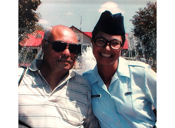 Photo of Nina Denny (right) in her dress uniform and her father, Michael Navetta