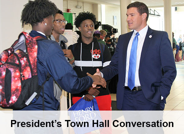 President Kavalhuna with students, text reads: President's Town Hall Conversation