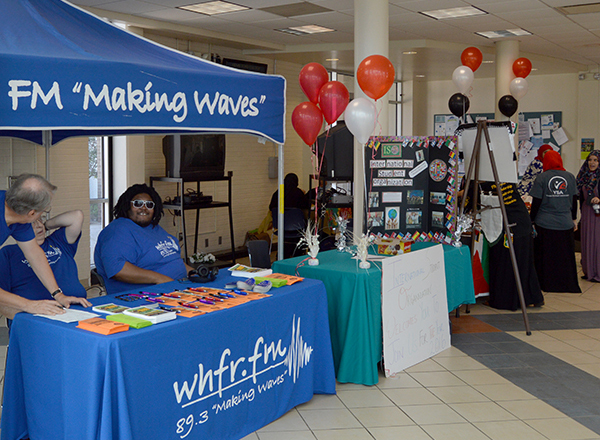 Students running various club and organization booths for Welcome Back Days