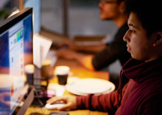 Student working on a computer terminal