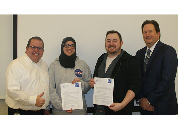 Group shot of Browning, O'Bryan, and the two scholarship winners