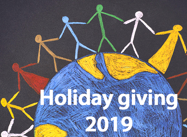 chalk-drawn image of a globe with stick people surrounding it