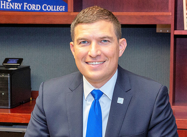President Kavalhuna at his desk