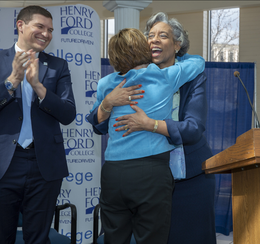 Business faculty member Jacqueline Lawson (far right) moderated the panel discussion and presented the faculty award to Linda Brandt.