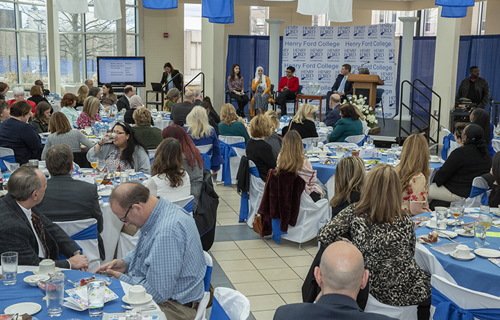 Panelists speak during Women's Recognition Luncheon. 