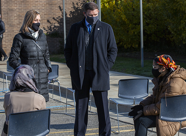 President Kavalhuna with his wife, Courtney, speak to students at the event.