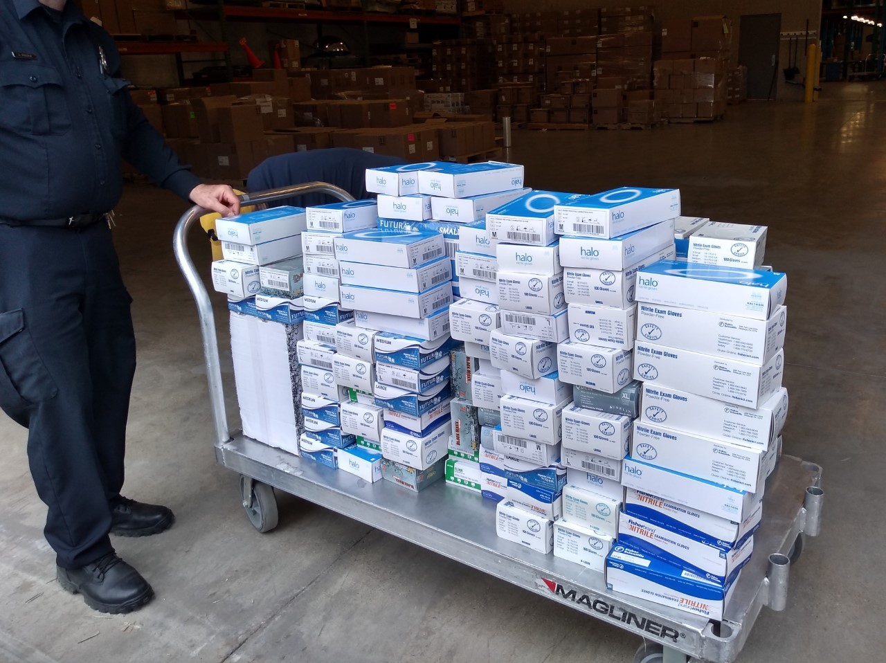 Supplies counted and loaded on a cart for shipping to Beaumont.