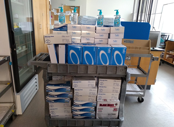 Supplies loaded on a cart and ready to pack up