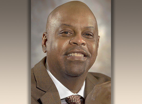 A headshot of Dr. Fredrick Douglass Dixon. 