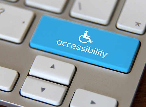 A picture of a computer keyboard with an accessibility key.