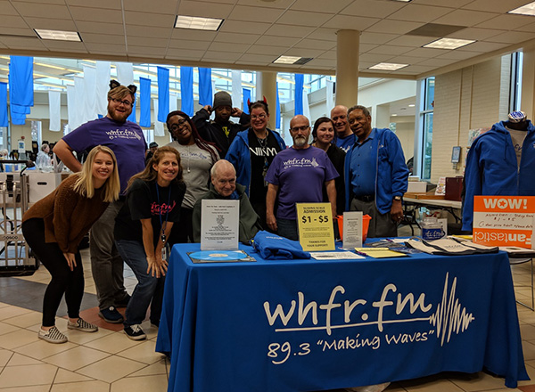 WHFR-FM staffers and students get ready to greet customers at the WHFR Record Show. 
