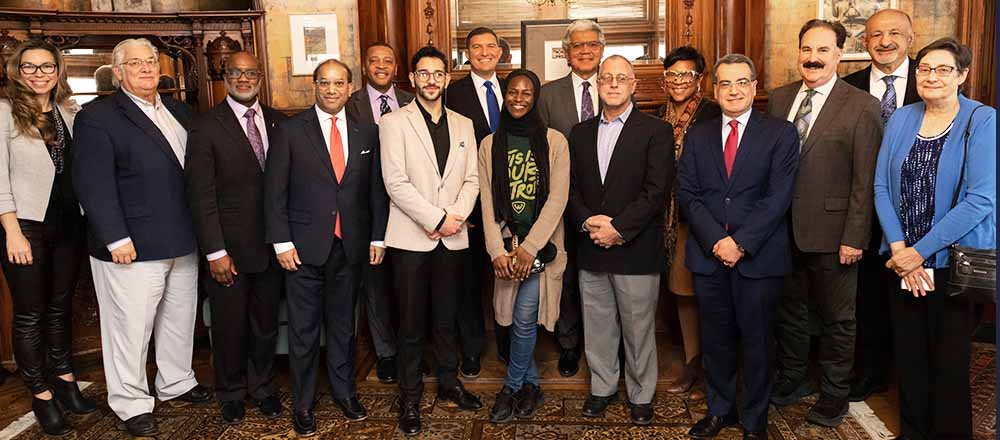 L-R: HFC Trustee Irene Watts, WSU Board of Governors' Mark Gaffney, HFC Vice President for Institutional Advancement Reginald Best, Detroit Chamber CEO Sandy Baruah, Rep. Tyrone Carter, HFC alumnus Mohammad Turaani, HFC President Russ Kavalhuna, HFC alum