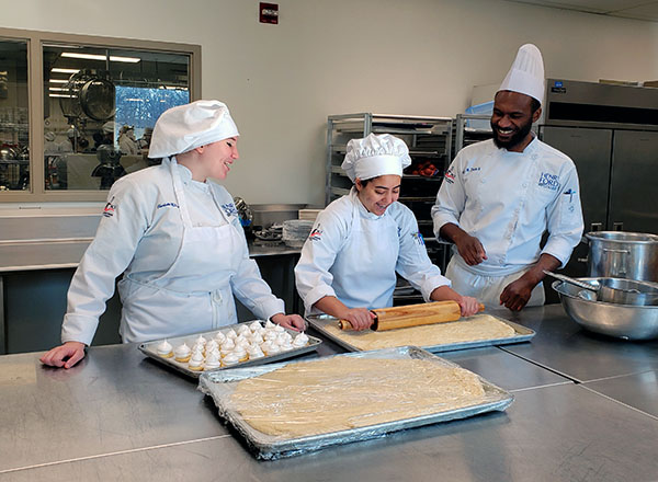 Students preparing baked goods with pastry chef Keith Davis II