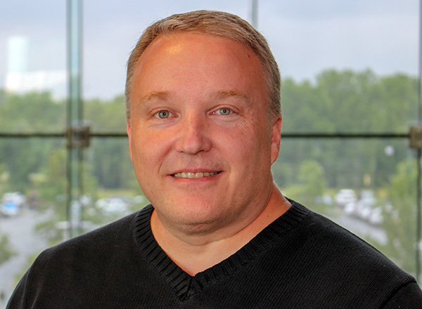 headshot of Guy Lotowicz