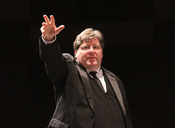 G. Kevin Dewey in his element, conducting a choir. 