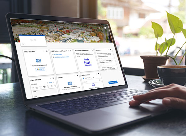 Ellucian Experience interface shown on a laptop computer screen.