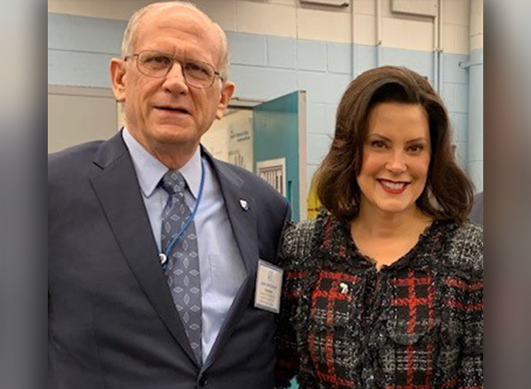 From L-R: John McDonald and Gov. Gretchen Whitmer. 