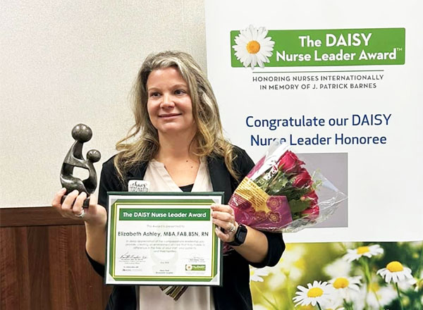 HFC nursing alumna Elizabeth Ashley receiving the Daisy Award.