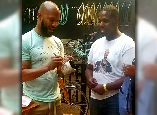 From L-R: Rapper Common and Centurium Frost. Frost designed a custom-made mug for Common. 