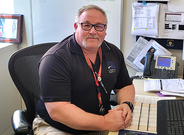 Mike Ball at his desk in the Campus Safety office.