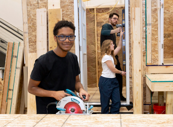 Student building a prototype home.