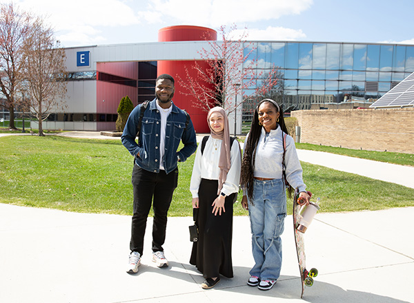 Students outside of the tech building. 