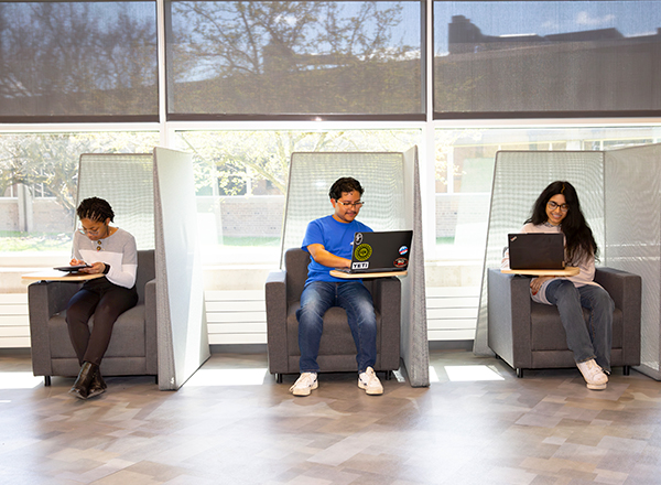 Students studying in the tech study spaces.