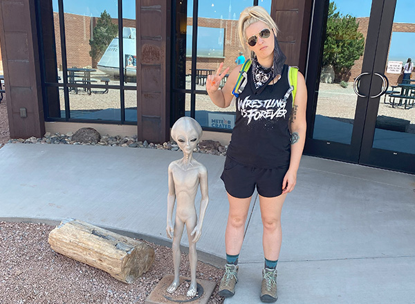 Stephanie Scicluna hangs out with a little green man. 