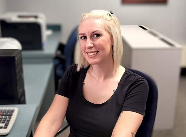 Stephanie Scicluna at her desk.