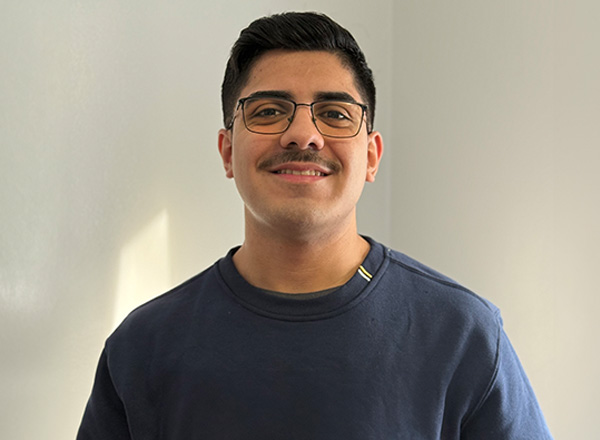 Headshot of Christopher Serrano. 