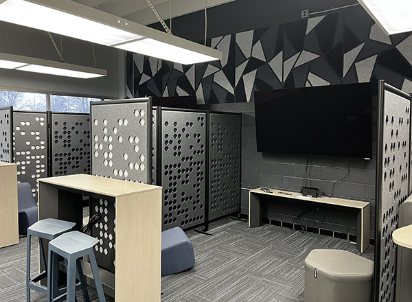 Pod collaboration area with sound-deading wall panels and state-of-the-art equipment