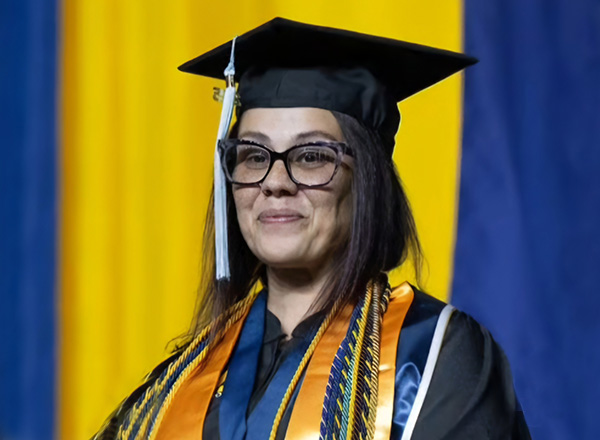 Kimberly Bertges in cap and gown