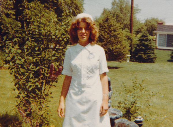 Dr. Mary Beth Bolton standing, in nursing uniform, ca. 1972
