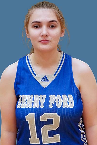 Portrait of Hailey Emon in blue Henry Ford jersey on blue background