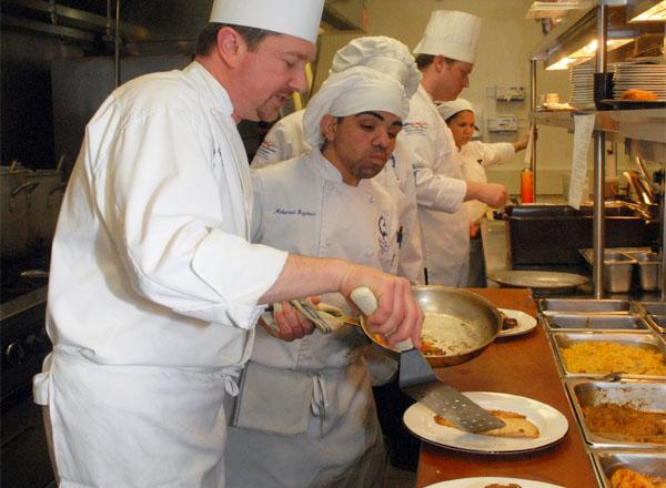 Chefs cooking and preparing food