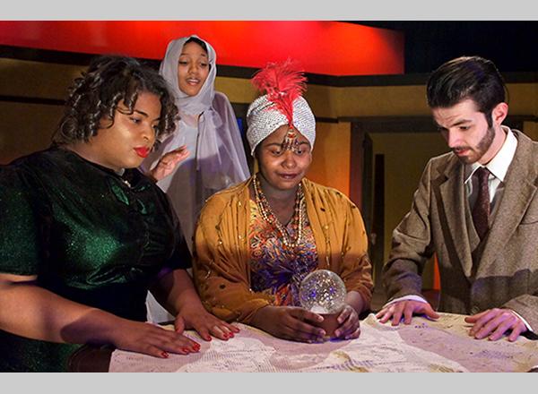 Left to right: Kennedy Cooper as Ruth Condomine, Natasha Hawkins as Elvira, Durshara Kirby as Madame Arcati and Jesse Mattox as Charles Condomine