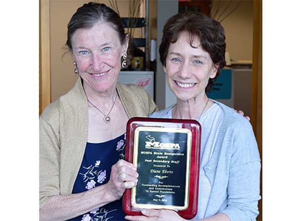 Maureen Webster (left) congratulates Diane Ebert on her award