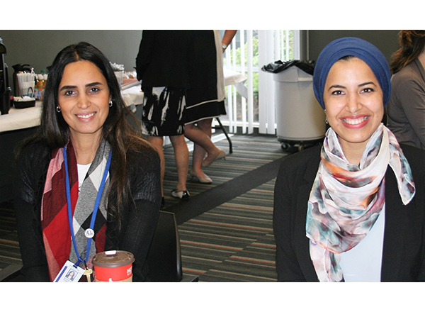 Fadlallah and Aburahma sitting next to each other