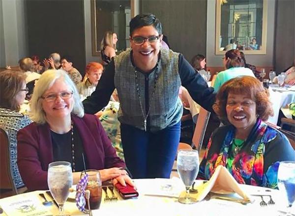 Three women at a table