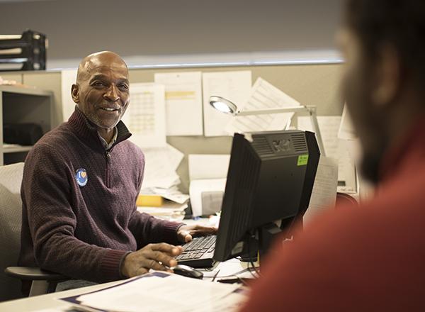 Advisor speaking to student