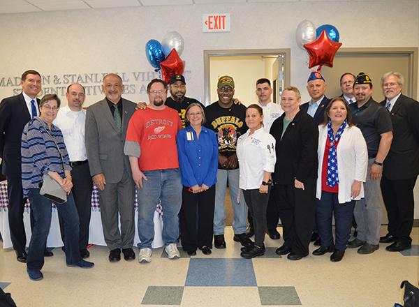 large group of people with balloons