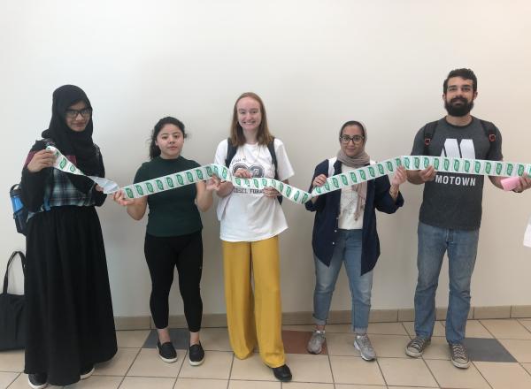 Members of the Student Environmental Association: Atika, Cynthia, Olivia, Rose, and Tom.